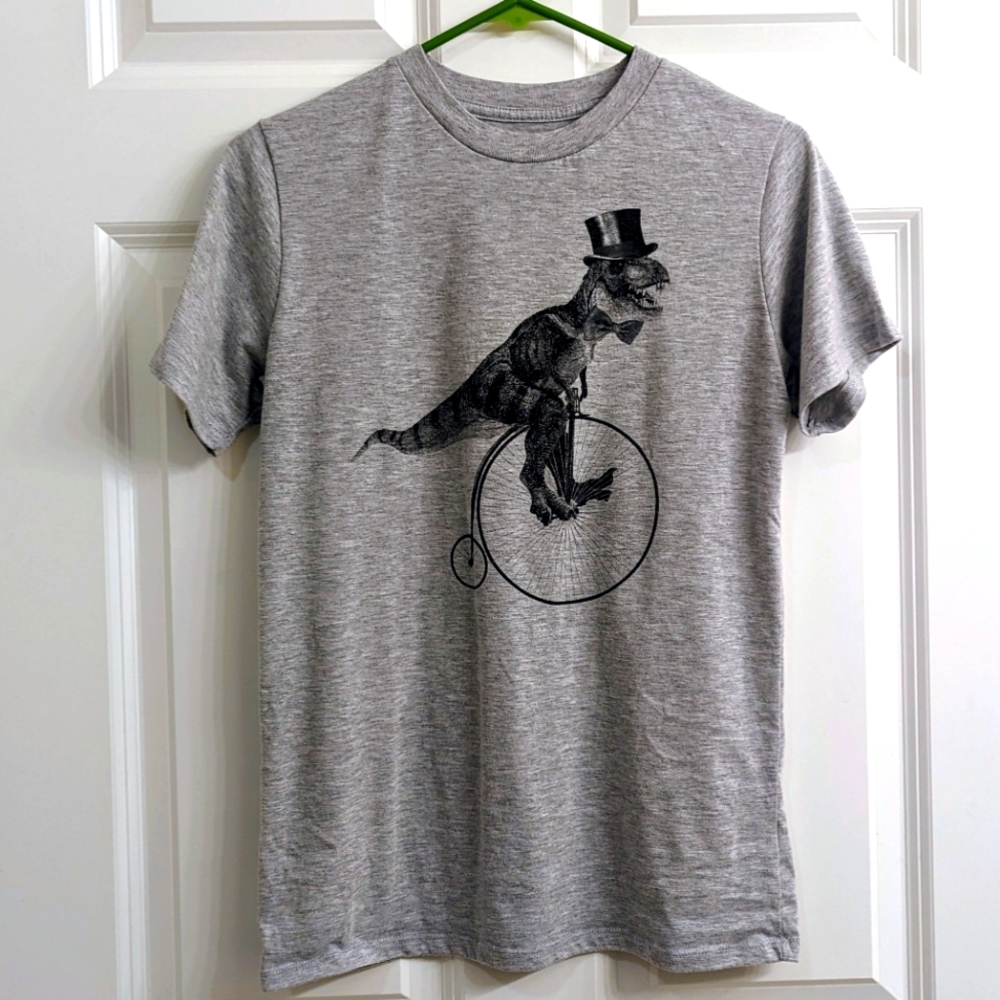 F21 T-Rex riding old fashioned bicycle with a top hat and bowtie size boys XL